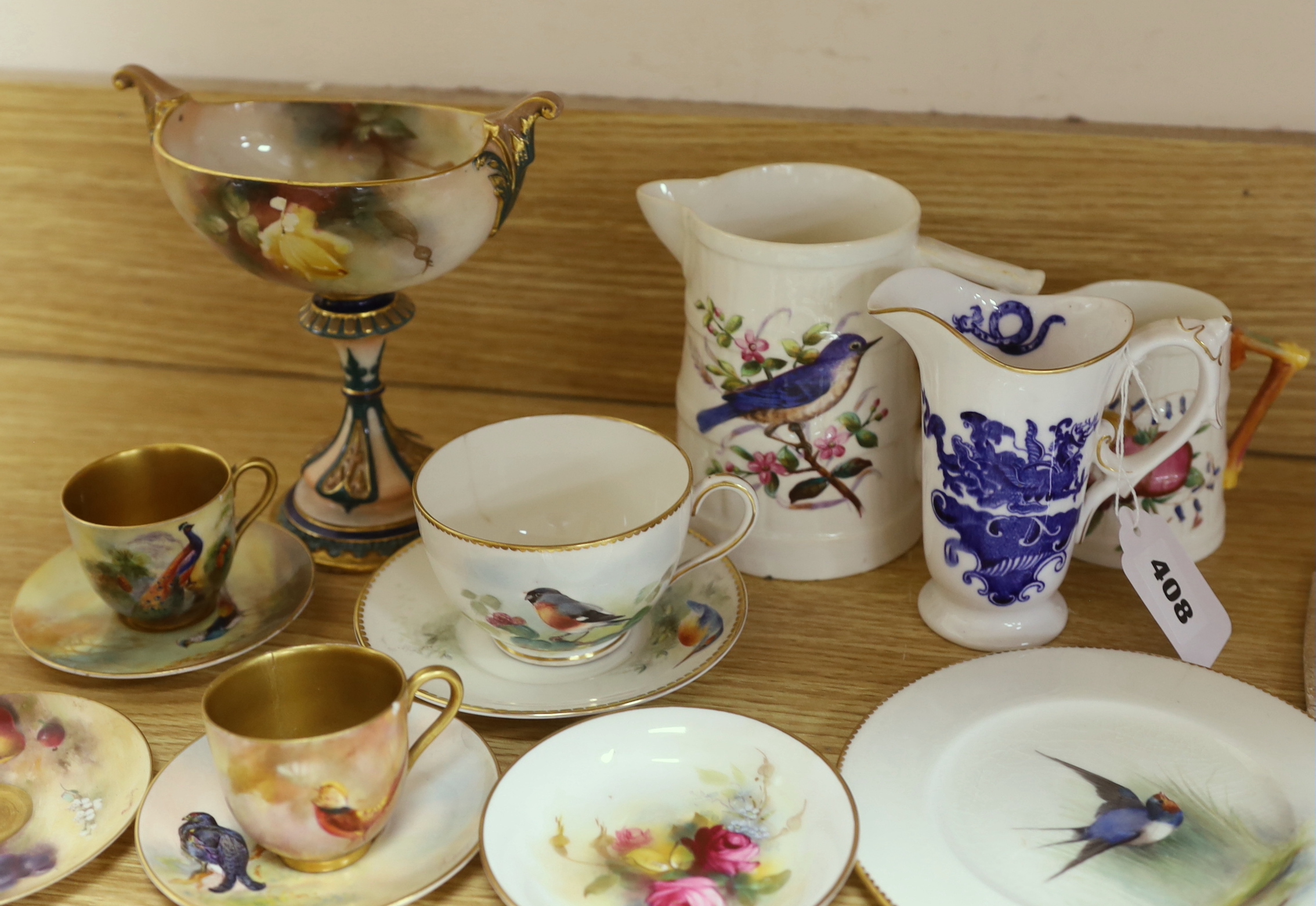 A large group of late 19th/early 20th century Royal Worcester tea wares, (some damage) including a signed bird painted pieces and signed fruit painted saucers